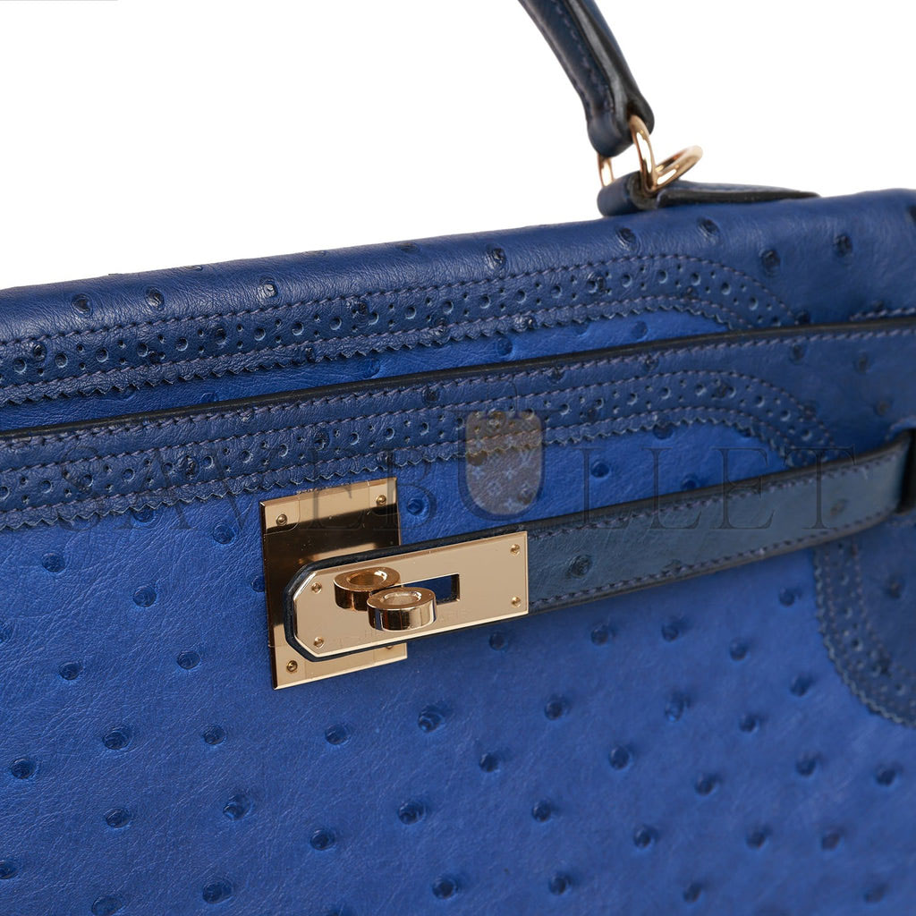 HERMES GHILLIES KELLY RETOURNE 32 BLEU SAPHIR, BLEU IRIS AND BLEU DE MALTE OSTRICH PERMABRASS HARDWARE (32cm)